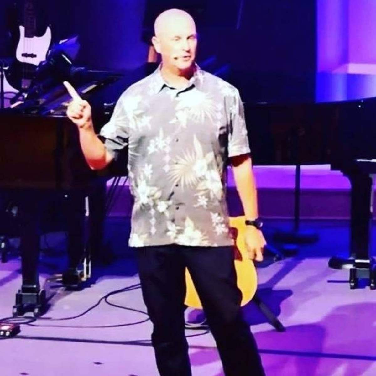 Pastor preaching on stage